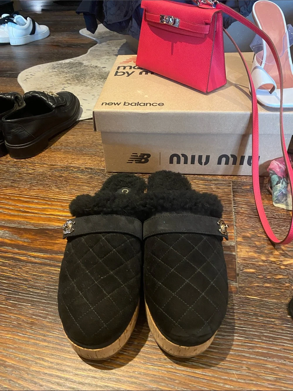 CHANEL Black Quilted Shearling Slip-On Mules with Gold CC Accent